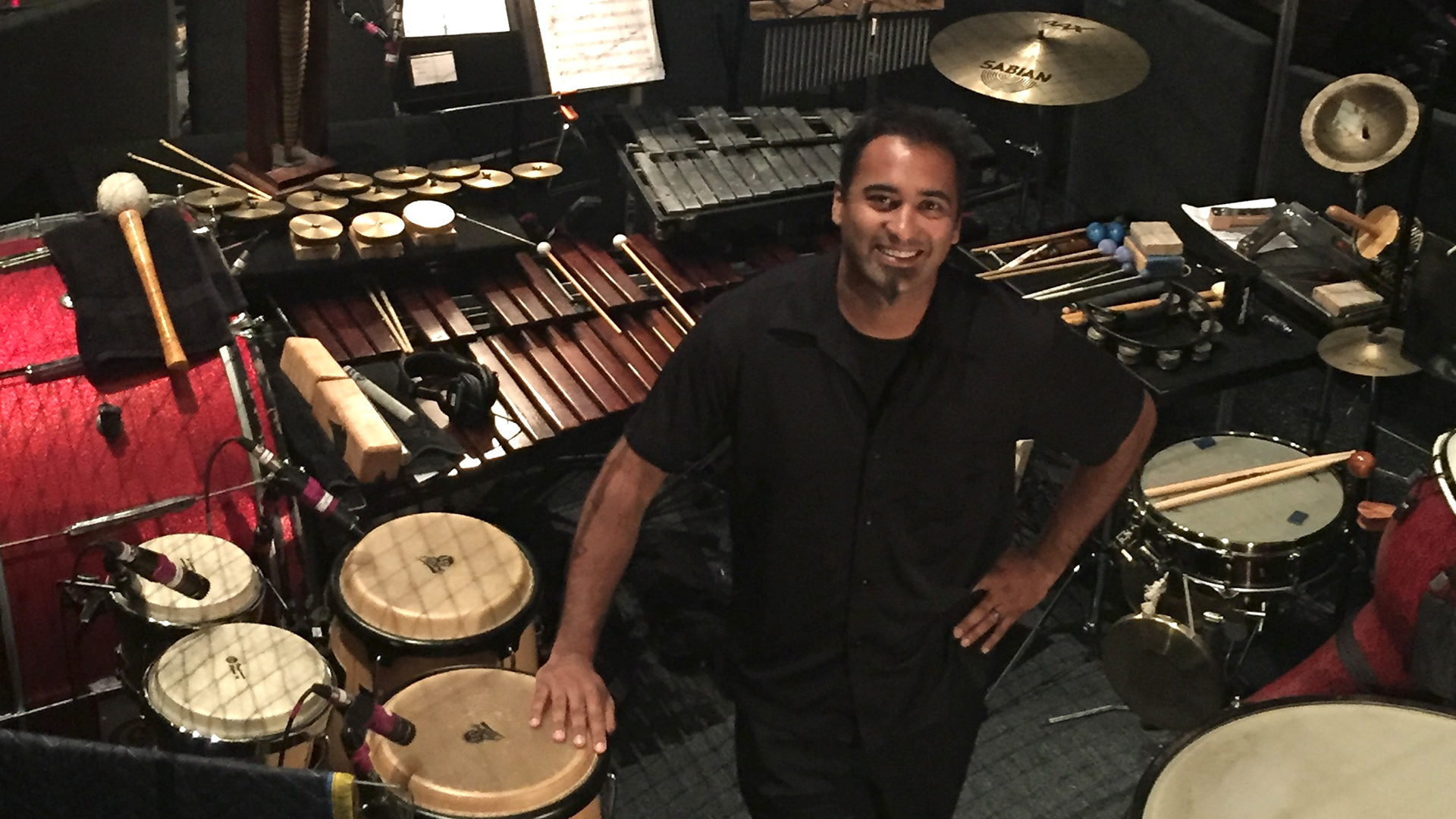Drummer performing during a live music event
