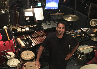 Drummer performing during a live music event